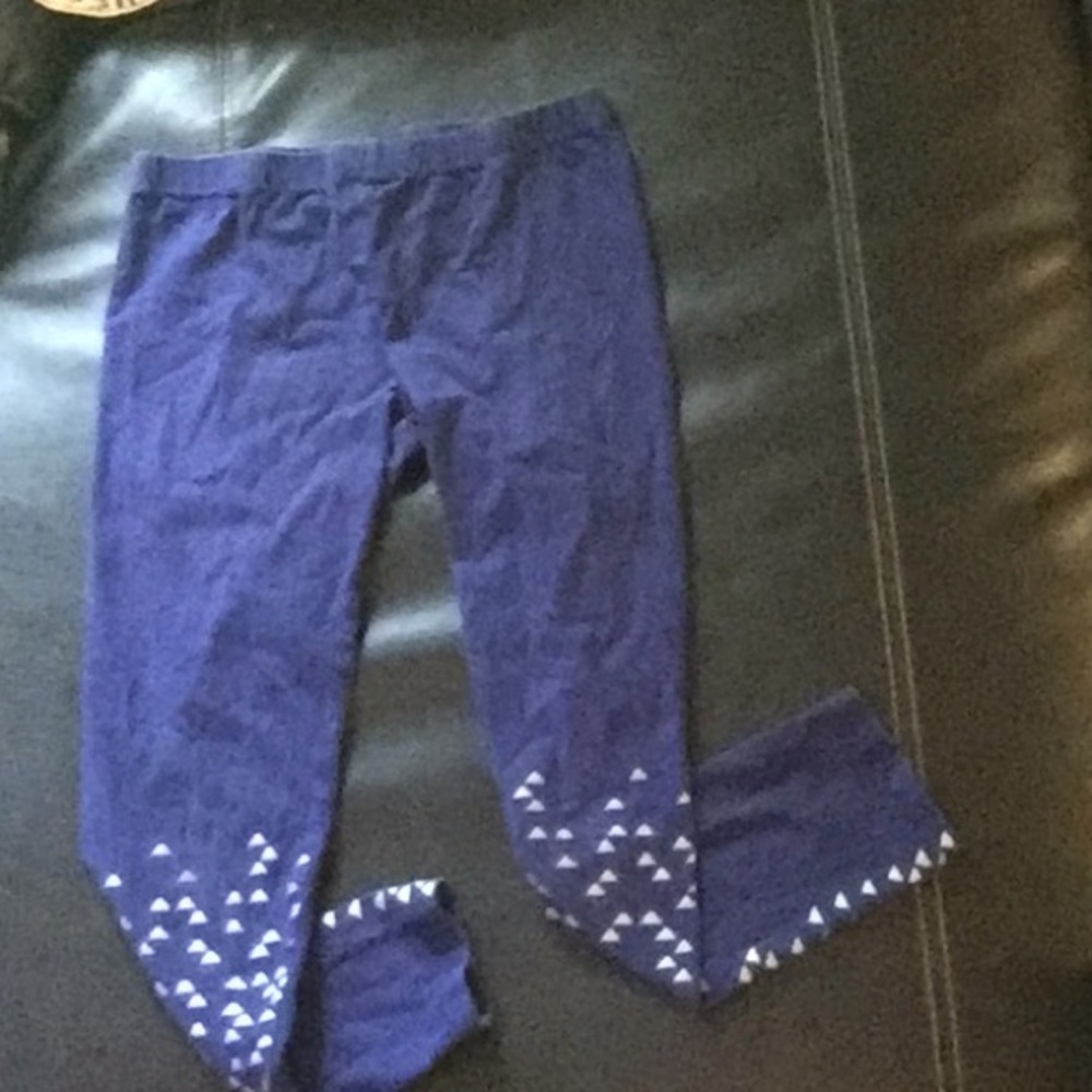 Blue leggings with silver triangles
